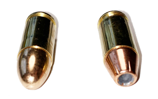 A Full Metal Jacket Cartridge (L) and a Hollow Point Cartridge (R)